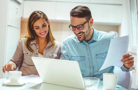 Couple using You Need A Cash Plan